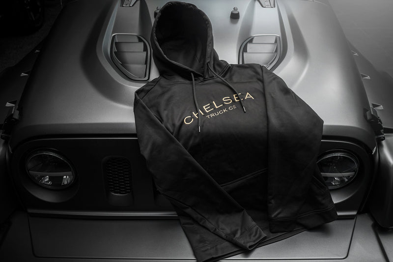 Special Edition Chelsea Truck Co Black with Gold Embroidery Hoodie On Grey Jeep 