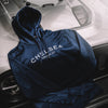 Navy Blue with White Embroidery Chelsea Truck Co Hoodie On Grey Car