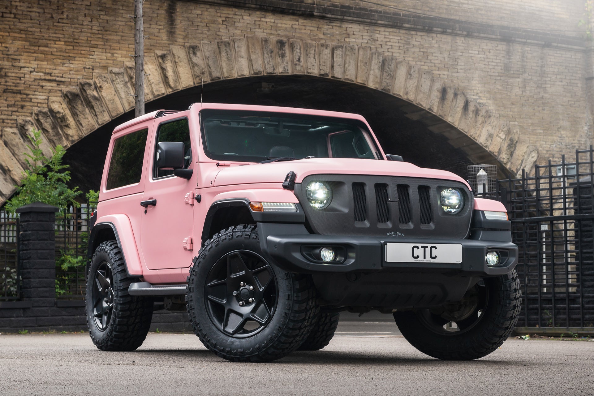 Black Jeep Wrangler With Pink Rims