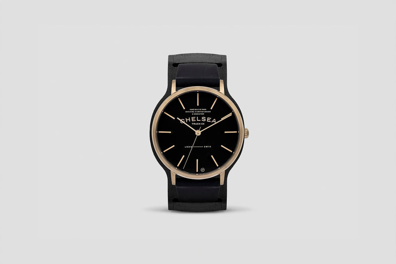 Full View Of The Satin Black Watches With Black Dial With Golden Hour Mark & Hands